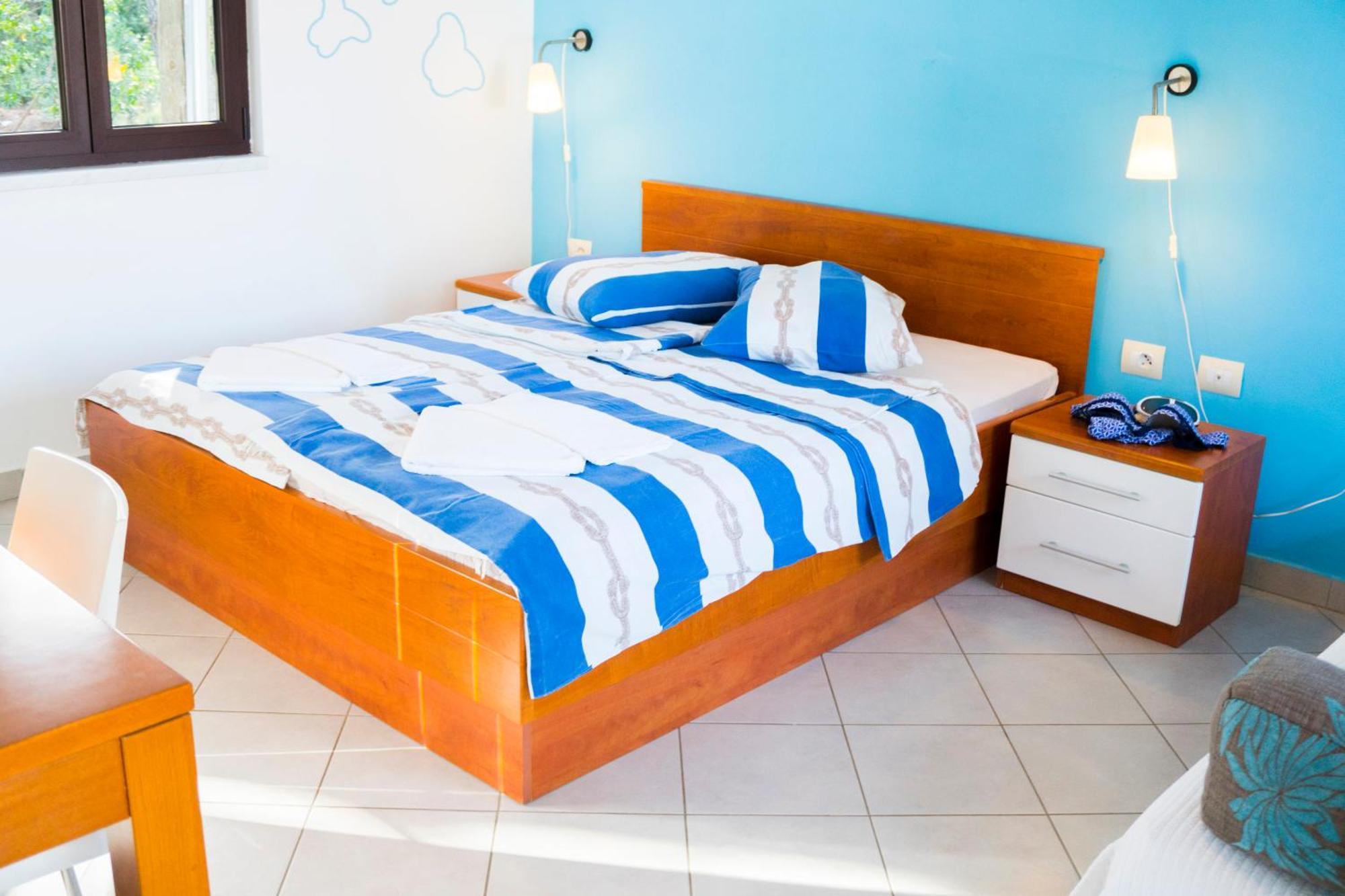 The Sea House Apartments Vis Bilik gambar