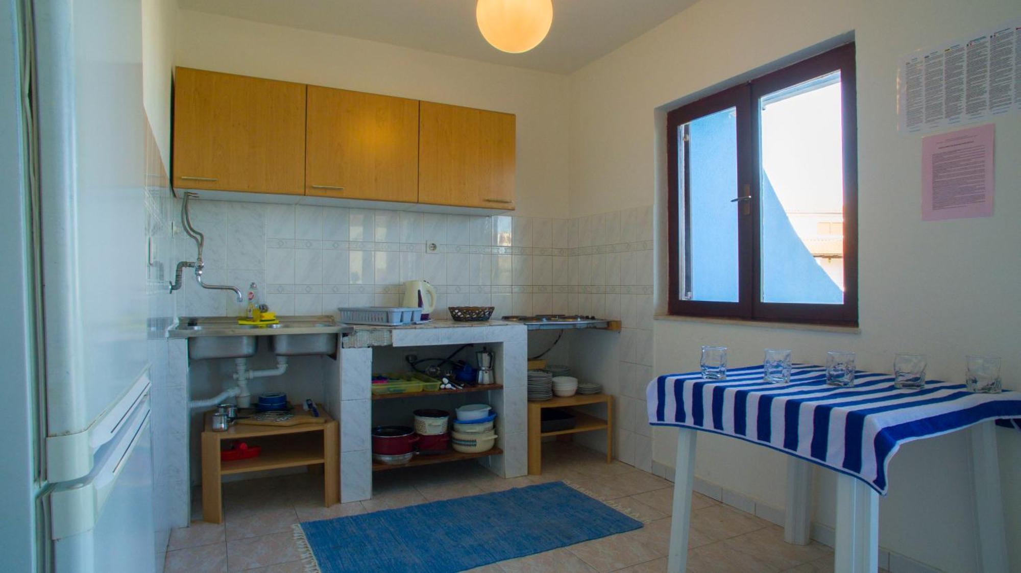 The Sea House Apartments Vis Bilik gambar