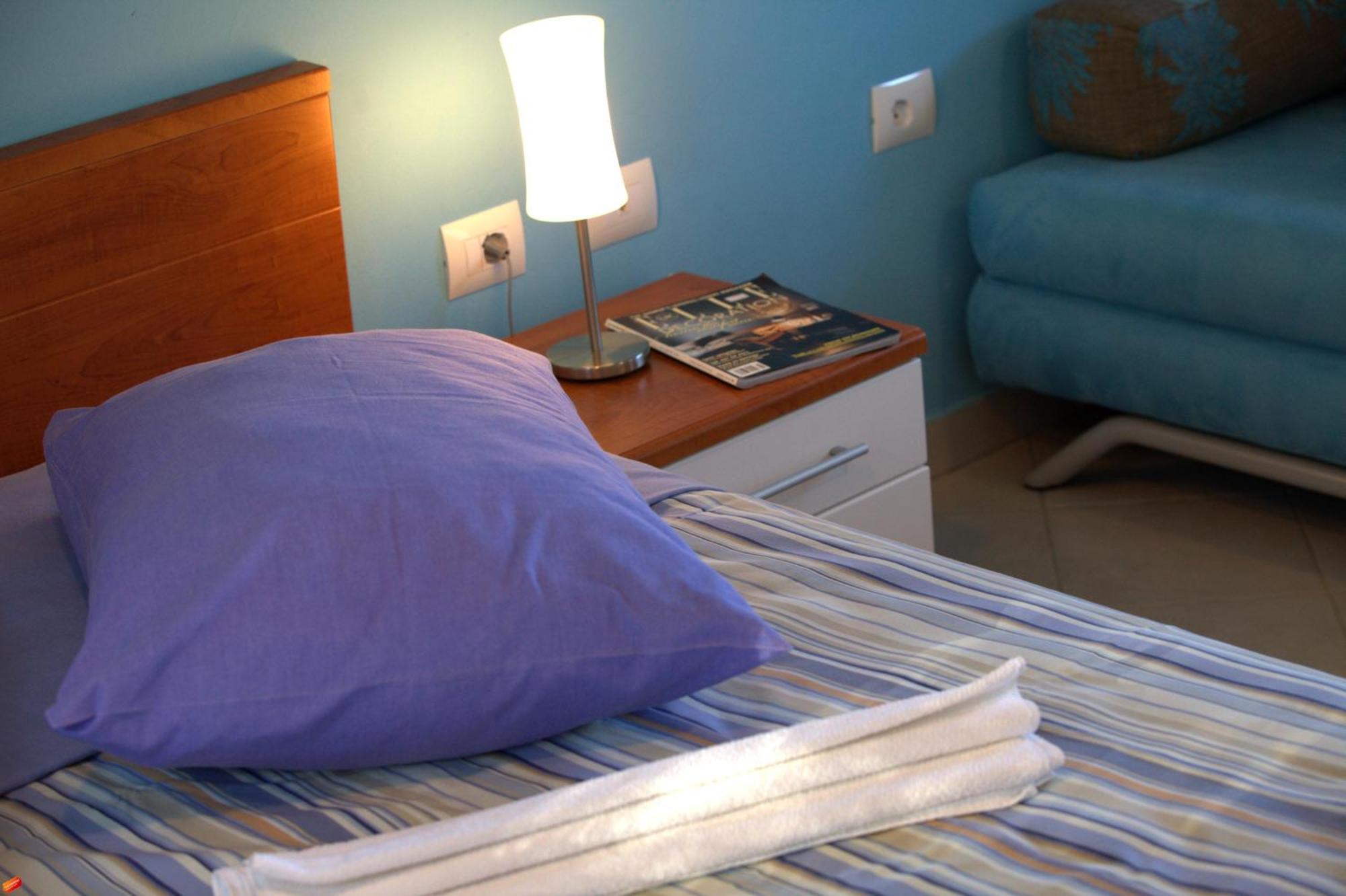 The Sea House Apartments Vis Bilik gambar